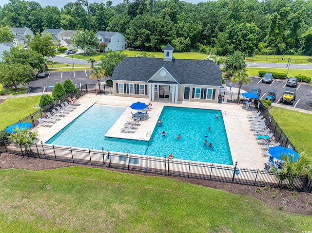 805 Cherry Bark Ct, Myrtle Beach, SC 29579 - community pool with a patio area and an outdoor structure