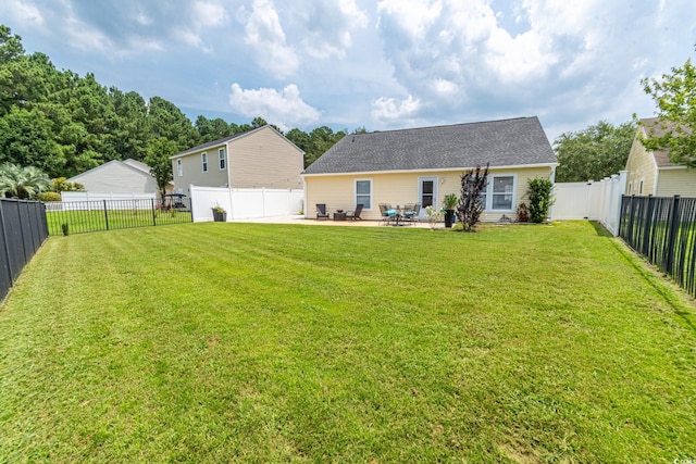 805 Cherry Bark Ct, Myrtle Beach, SC 29579 - back of property with a patio area and a fenced backyard