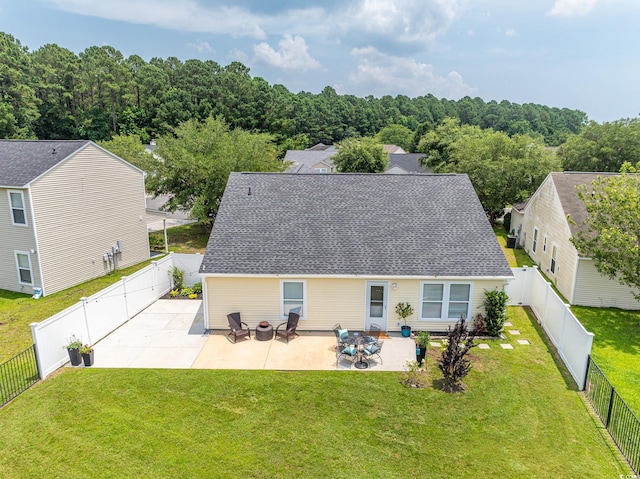 805 Cherry Bark Ct, Myrtle Beach, SC 29579 - back of property with a patio, a fenced backyard, and a shingled roof