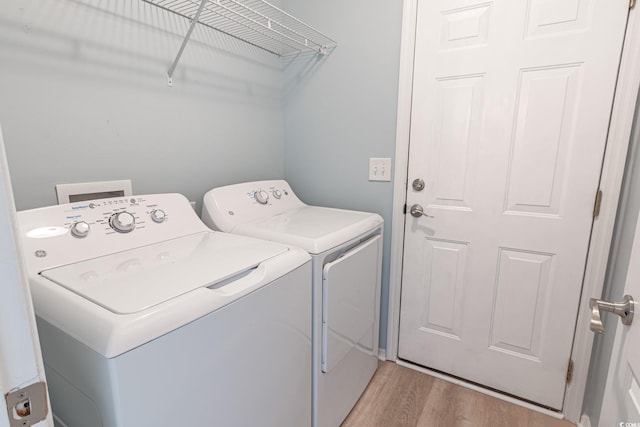 805 Cherry Bark Ct, Myrtle Beach, SC 29579 - laundry room with separate washer and dryer and light wood-style floors