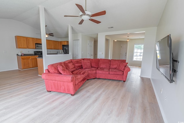 805 Cherry Bark Ct, Myrtle Beach, SC 29579 - living area featuring light wood-style flooring, a ceiling fan, and lofted ceiling