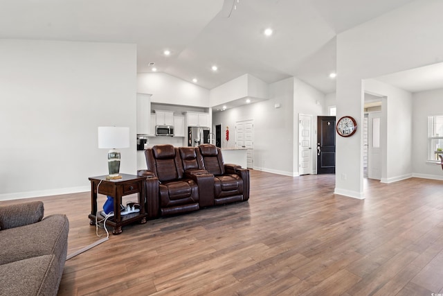 892 Harrison Mill St, Myrtle Beach, SC 29579 - living room featuring wood finished floors, recessed lighting, a ceiling fan, and high vaulted ceiling