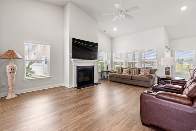 892 Harrison Mill St, Myrtle Beach, SC 29579 - living room with high vaulted ceiling, ceiling fan, wood finished floors, a fireplace with flush hearth, and recessed lighting