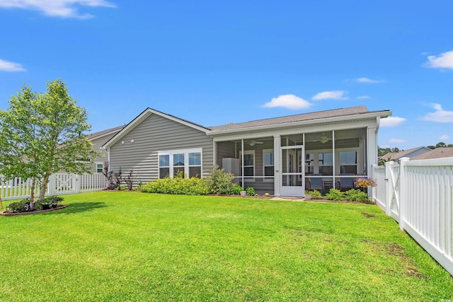 892 Harrison Mill St, Myrtle Beach, SC 29579 - rear view of property with a sunroom, ceiling fan, and a fenced backyard