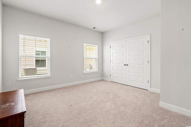 892 Harrison Mill St, Myrtle Beach, SC 29579 - unfurnished bedroom with carpet floors, multiple windows, and a closet