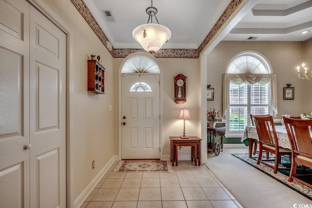 911 Tilghman Forest Dr, North Myrtle Beach, SC 29582 - entryway with crown molding and light tile patterned floors