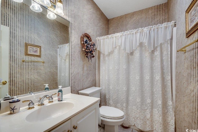 911 Tilghman Forest Dr, North Myrtle Beach, SC 29582 - bathroom with wallpapered walls, vanity, and curtained shower