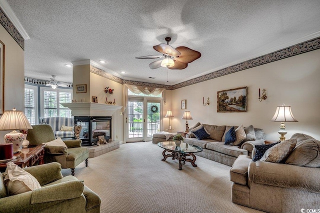 911 Tilghman Forest Dr, North Myrtle Beach, SC 29582 - carpeted living room featuring ceiling fan, a textured ceiling, ornamental molding, healthy amount of natural light, and a multi sided fireplace