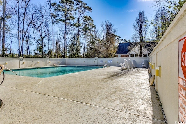 911 Tilghman Forest Dr, North Myrtle Beach, SC 29582 - community pool featuring a patio