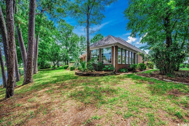 911 Tilghman Forest Dr, North Myrtle Beach, SC 29582 - view of green lawn