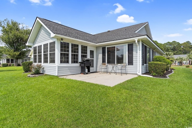 2783 Sanctuary Blvd, Conway, SC 29526 - back of house with a patio, a shingled roof, and a lawn