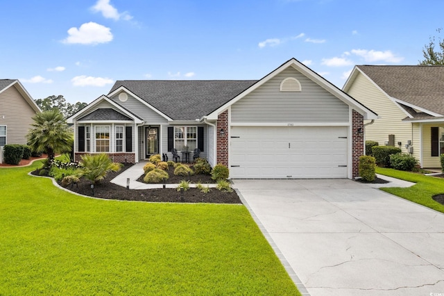 2783 Sanctuary Blvd, Conway, SC 29526 - ranch-style house featuring brick siding, a garage, a front lawn, and driveway