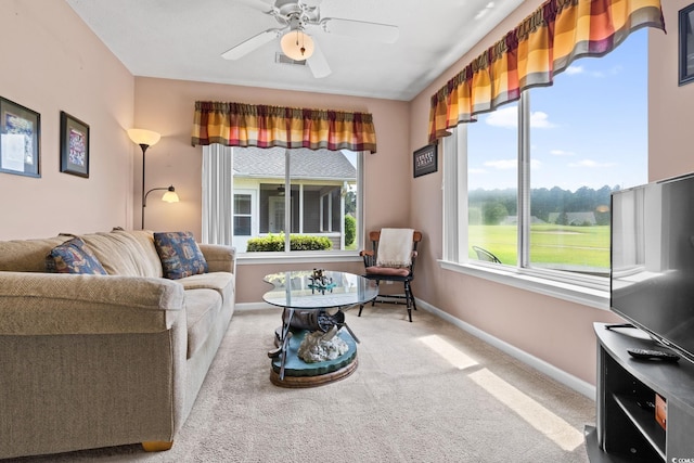2783 Sanctuary Blvd, Conway, SC 29526 - carpeted living area with baseboards and a ceiling fan