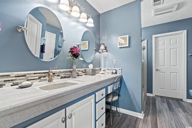2783 Sanctuary Blvd, Conway, SC 29526 - full bath featuring backsplash, wood finished floors, and vanity