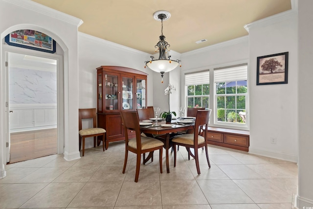 5904 Bridlewood Rd, North Myrtle Beach, SC 29582 - dining area featuring crown molding and light tile patterned floors