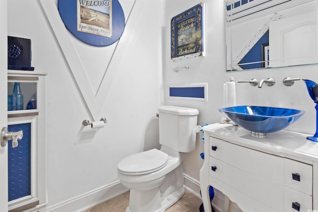 5904 Bridlewood Rd, North Myrtle Beach, SC 29582 - half bathroom featuring vanity and tile patterned flooring