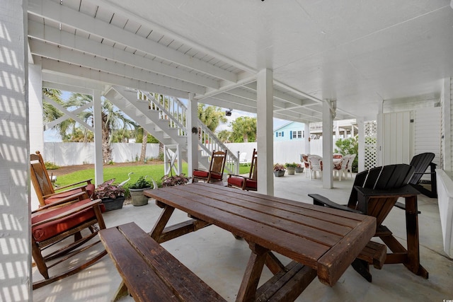 30462NDAVE N 62nd Ave N, North Myrtle Beach, SC 29582 - fenced backyard with outdoor dining space, a patio, and stairway