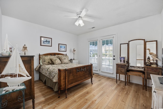 30462NDAVE N 62nd Ave N, North Myrtle Beach, SC 29582 - bedroom with access to outside, light wood-style flooring, and a ceiling fan