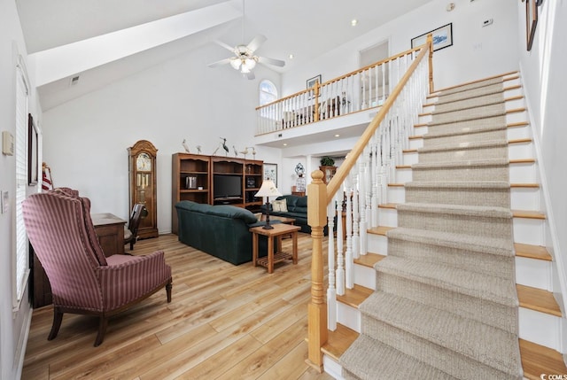 30462NDAVE N 62nd Ave N, North Myrtle Beach, SC 29582 - stairs featuring hardwood / wood-style floors, a towering ceiling, a ceiling fan, and recessed lighting