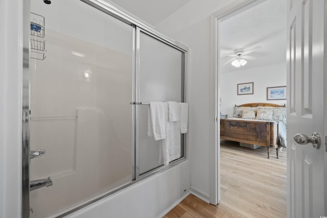 30462NDAVE N 62nd Ave N, North Myrtle Beach, SC 29582 - bathroom with ceiling fan, wood finished floors, bath / shower combo with glass door, and vanity