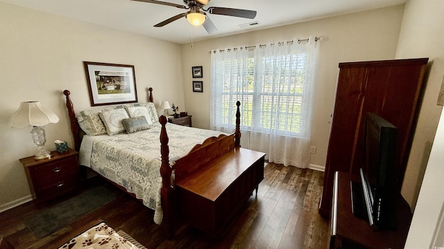 1300 Ruddy Ct, Conway, SC 29527 - bedroom with dark wood finished floors and ceiling fan