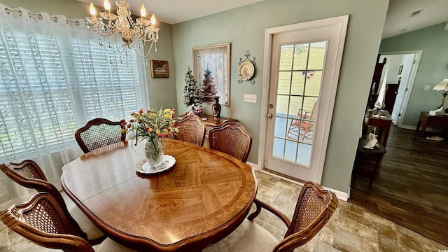 1300 Ruddy Ct, Conway, SC 29527 - dining space with a chandelier and baseboards