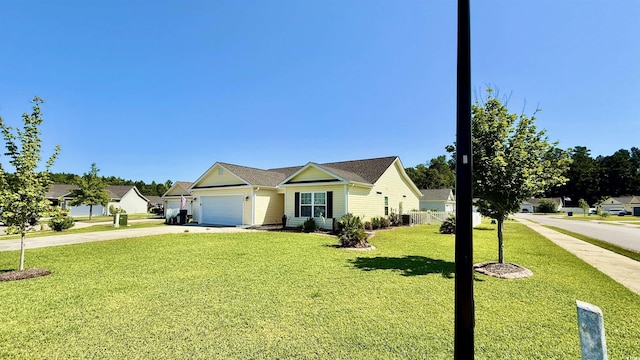 1300 Ruddy Ct, Conway, SC 29527 - ranch-style house with driveway, a front lawn, and an attached garage
