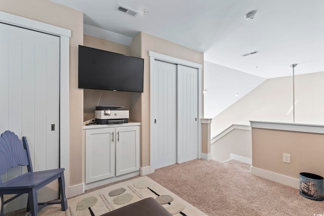 6624 Lagoon Pl, Myrtle Beach, SC 29572 - kitchen featuring light colored carpet and lofted ceiling
