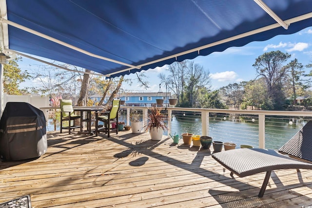 6624 Lagoon Pl, Myrtle Beach, SC 29572 - wooden deck featuring area for grilling and outdoor dining area