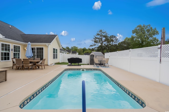 2395 Morlynn Dr, Myrtle Beach, SC 29577 - view of pool featuring a storage shed, a fenced backyard, outdoor dining area, and a patio