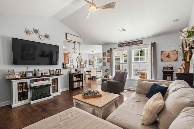 2395 Morlynn Dr, Myrtle Beach, SC 29577 - living area with lofted ceiling, wood finished floors, a ceiling fan, and a fireplace