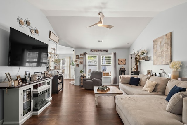 2395 Morlynn Dr, Myrtle Beach, SC 29577 - living room featuring vaulted ceiling, ceiling fan, and dark wood-style flooring