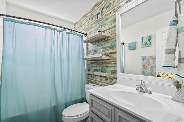 2395 Morlynn Dr, Myrtle Beach, SC 29577 - full bathroom featuring vanity, wood walls, and shower / tub combo