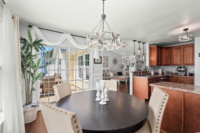 2395 Morlynn Dr, Myrtle Beach, SC 29577 - dining space featuring a chandelier and wood finished floors
