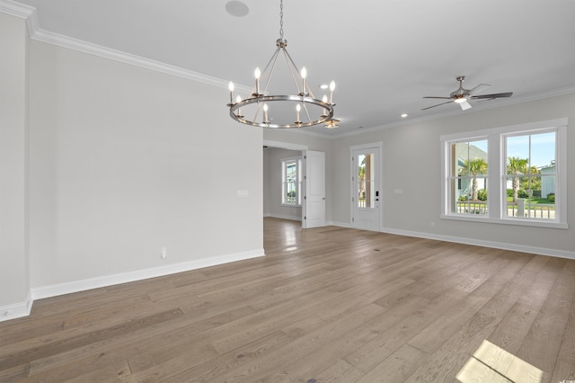 8148 Living Tide Dr, Myrtle Beach, SC 29572 - unfurnished living room with a chandelier, ornamental molding, light wood-style flooring, and a ceiling fan