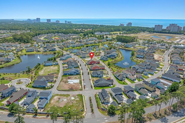 8148 Living Tide Dr, Myrtle Beach, SC 29572 - aerial view of property and surrounding area featuring nearby suburban area and a large body of water
