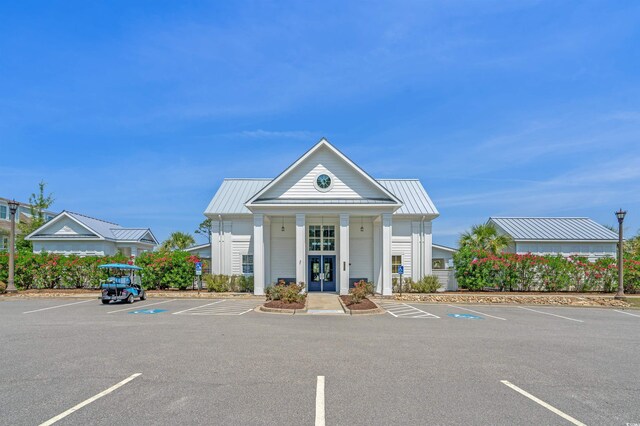 8148 Living Tide Dr, Myrtle Beach, SC 29572 - view of building exterior with uncovered parking