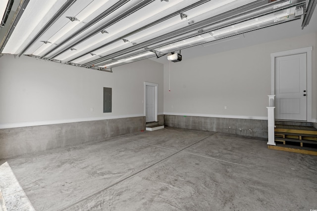 8148 Living Tide Dr, Myrtle Beach, SC 29572 - garage with electric panel and a garage door opener