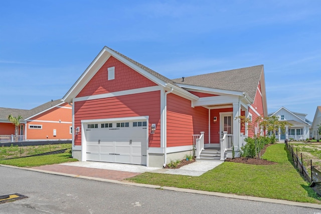 8148 Living Tide Dr, Myrtle Beach, SC 29572 - view of front facade featuring an attached garage, driveway, and a shingled roof