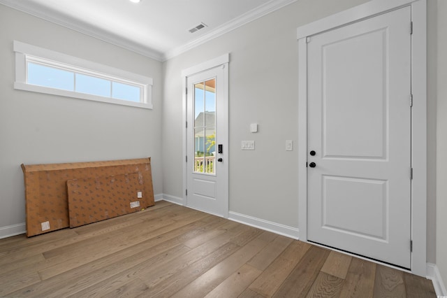 8148 Living Tide Dr, Myrtle Beach, SC 29572 - entryway featuring ornamental molding and wood-type flooring
