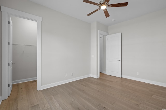 8148 Living Tide Dr, Myrtle Beach, SC 29572 - unfurnished bedroom with light wood-type flooring and ceiling fan