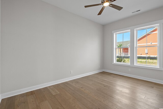 8148 Living Tide Dr, Myrtle Beach, SC 29572 - unfurnished room with wood-type flooring and a ceiling fan
