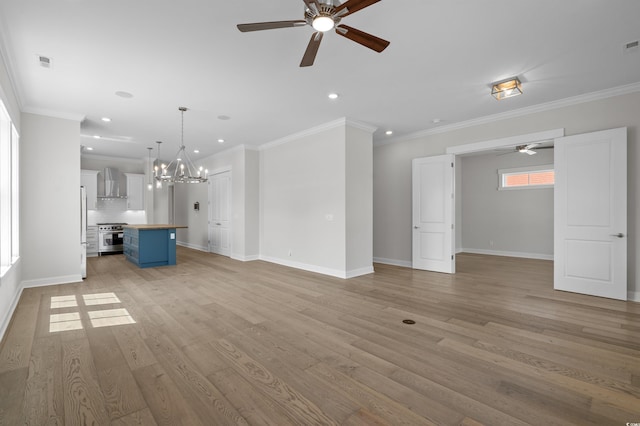 8148 Living Tide Dr, Myrtle Beach, SC 29572 - unfurnished living room with a ceiling fan, a chandelier, recessed lighting, light wood-style floors, and ornamental molding