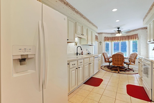 112 Birchwood Ln, Conway, SC 29526 - kitchen with white appliances, wallpapered walls, a ceiling fan, light countertops, and light tile patterned floors