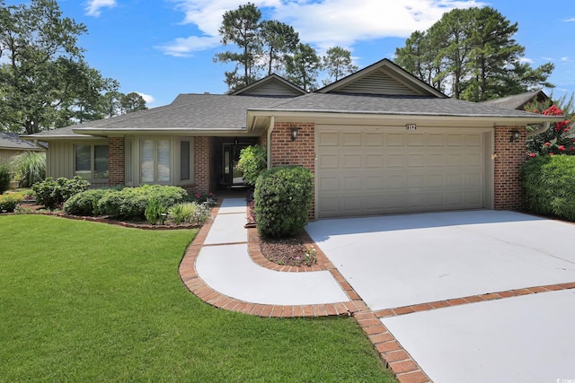 112 Birchwood Ln, Conway, SC 29526 - single story home with driveway, a shingled roof, brick siding, an attached garage, and a front lawn