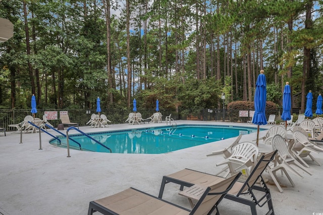 112 Birchwood Ln, Conway, SC 29526 - community pool with a patio and view of wooded area