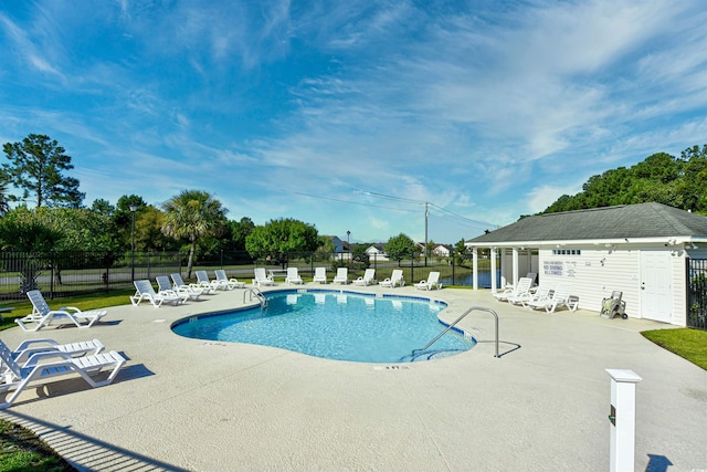 501 Painted Duck Ct, Myrtle Beach, SC 29588 - community pool featuring a patio area and an outbuilding