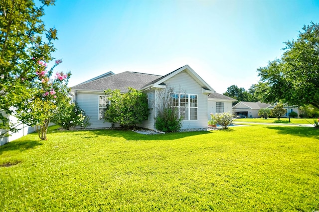 501 Painted Duck Ct, Myrtle Beach, SC 29588 - rear view of property with a lawn and a shingled roof