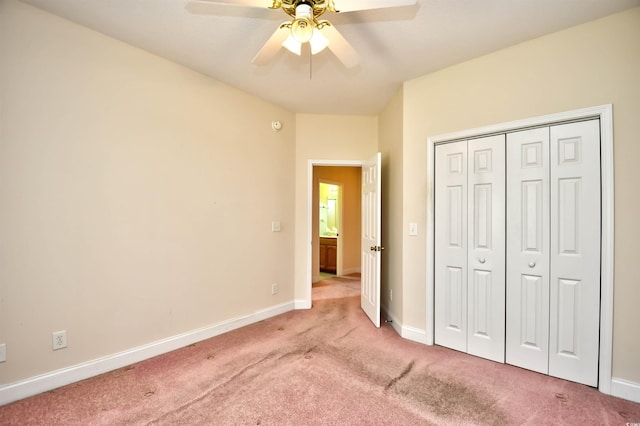 501 Painted Duck Ct, Myrtle Beach, SC 29588 - unfurnished bedroom with light colored carpet, a closet, and a ceiling fan