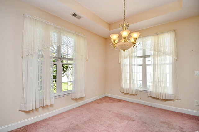 501 Painted Duck Ct, Myrtle Beach, SC 29588 - unfurnished room with a chandelier, carpet flooring, and a tray ceiling
